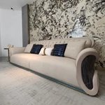 Cream Diamond-Tufted Leather Sofa with Scroll Armrests and Dark High-Gloss Wood Sides